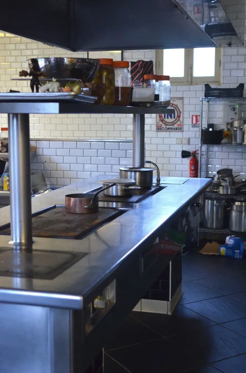 Stainless steel commercial kitchen hood in a Huntsville Alabama restaurant