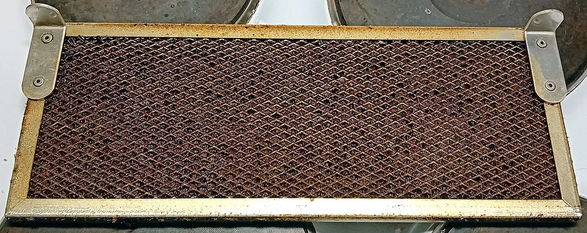 Hood filter heavy with grease buildup
